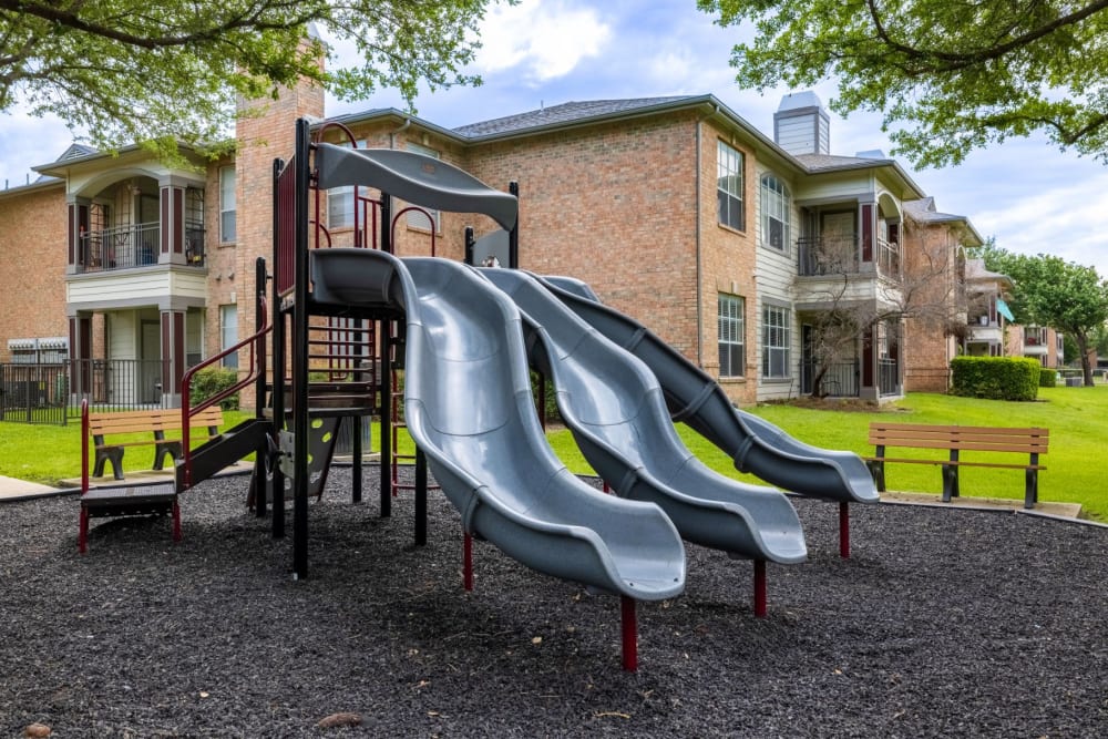 Park with a slide at Brooks on Preston in Plano, Texas