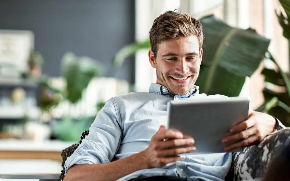 Resident looking at a tablet at Yauger Park Villas in Olympia, Washington