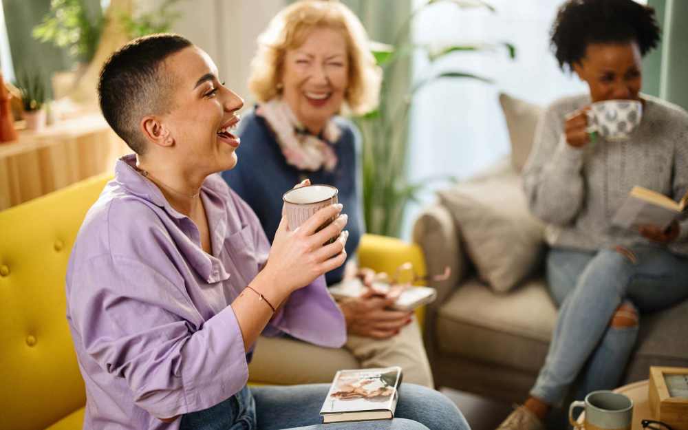Residents having a good time at the clubhouse at Mansions at Riverside in Tulsa, Oklahoma