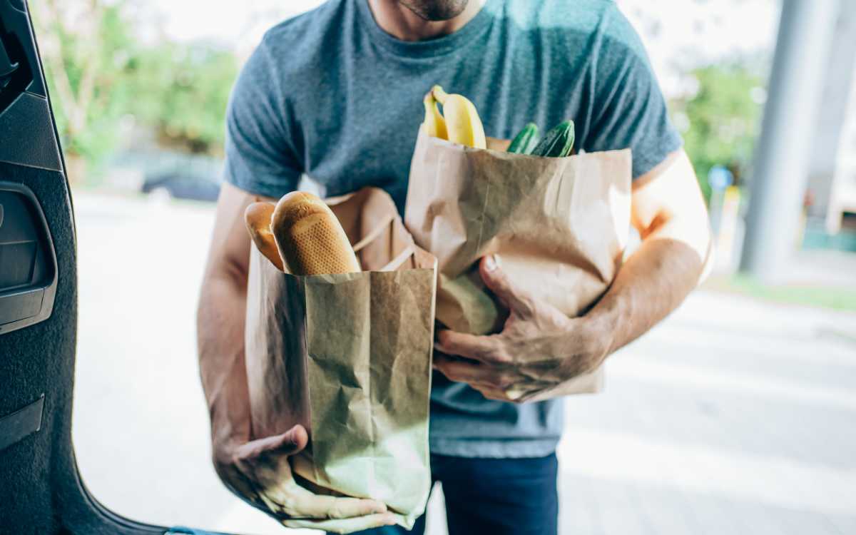 Resident unloading groceries at The Peak at Sky Mountain in Reno, Nevada