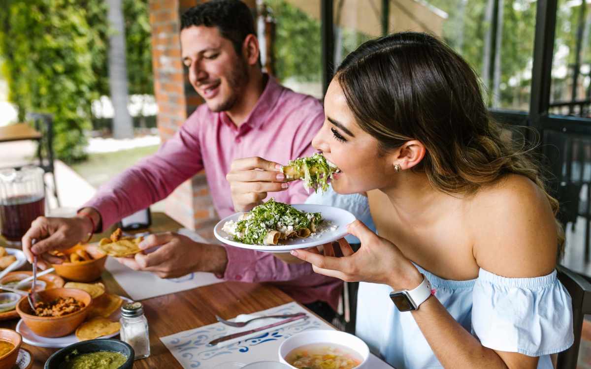 Resident couple having meals at their favorite restaurant near The Glen at Kensington in Kensington, Maryland