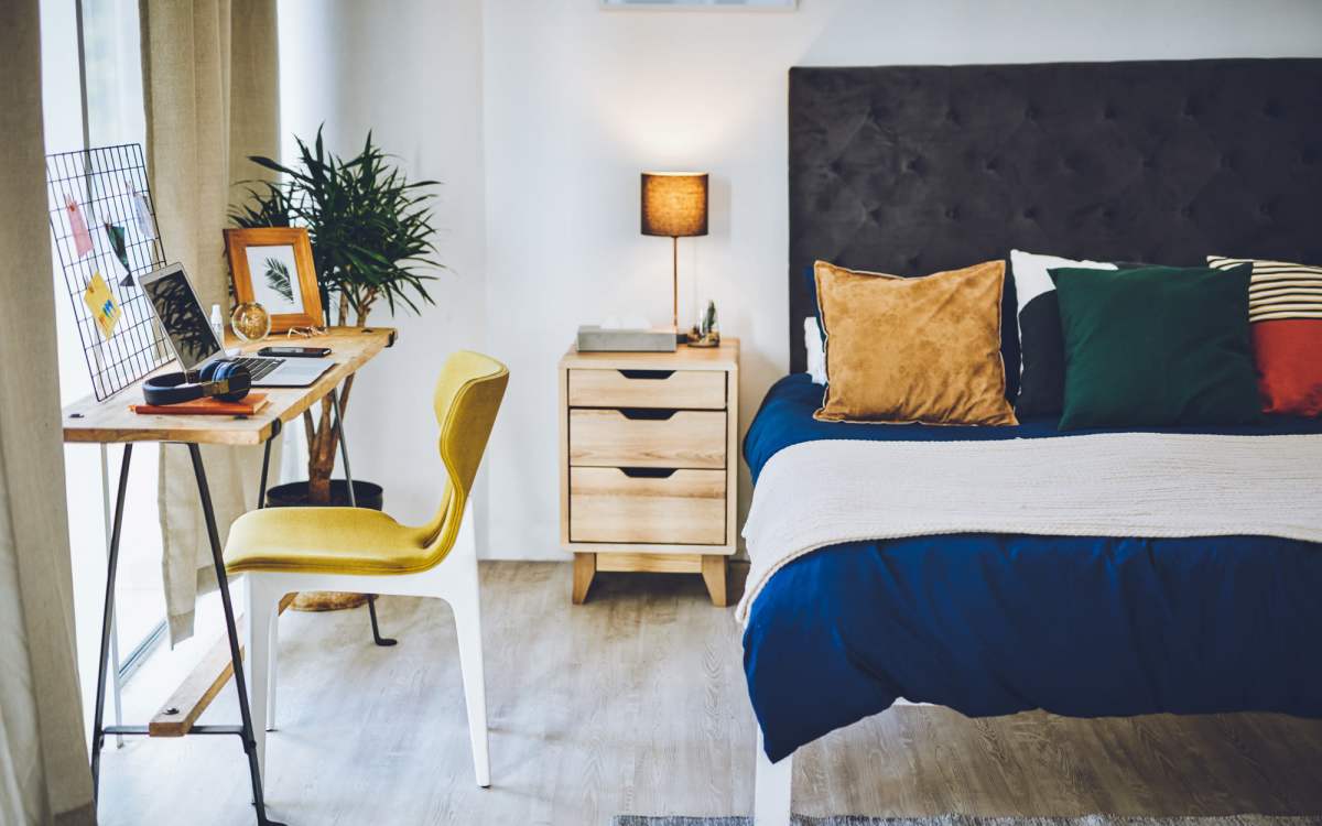 Bedroom with wooden flooring at Stone Lake in Indianapolis, Indiana
