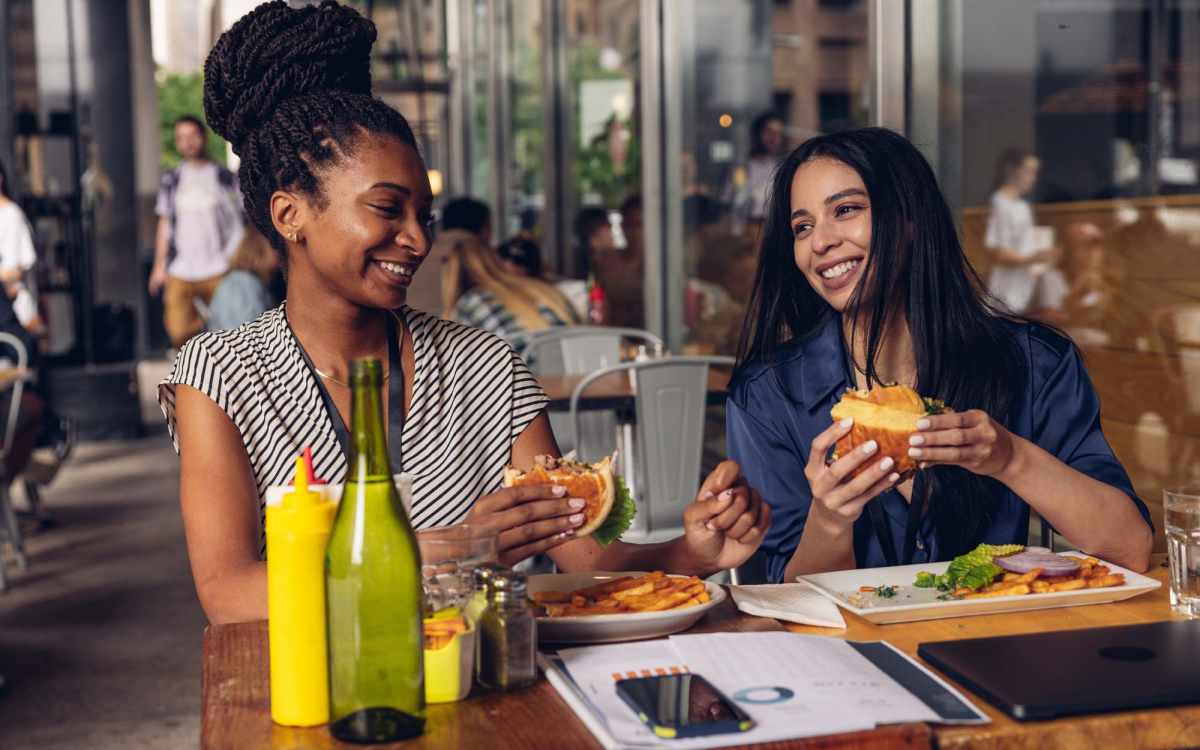 Resident having food in restaurant near Camas Meadows in Beaverton, Oregon
