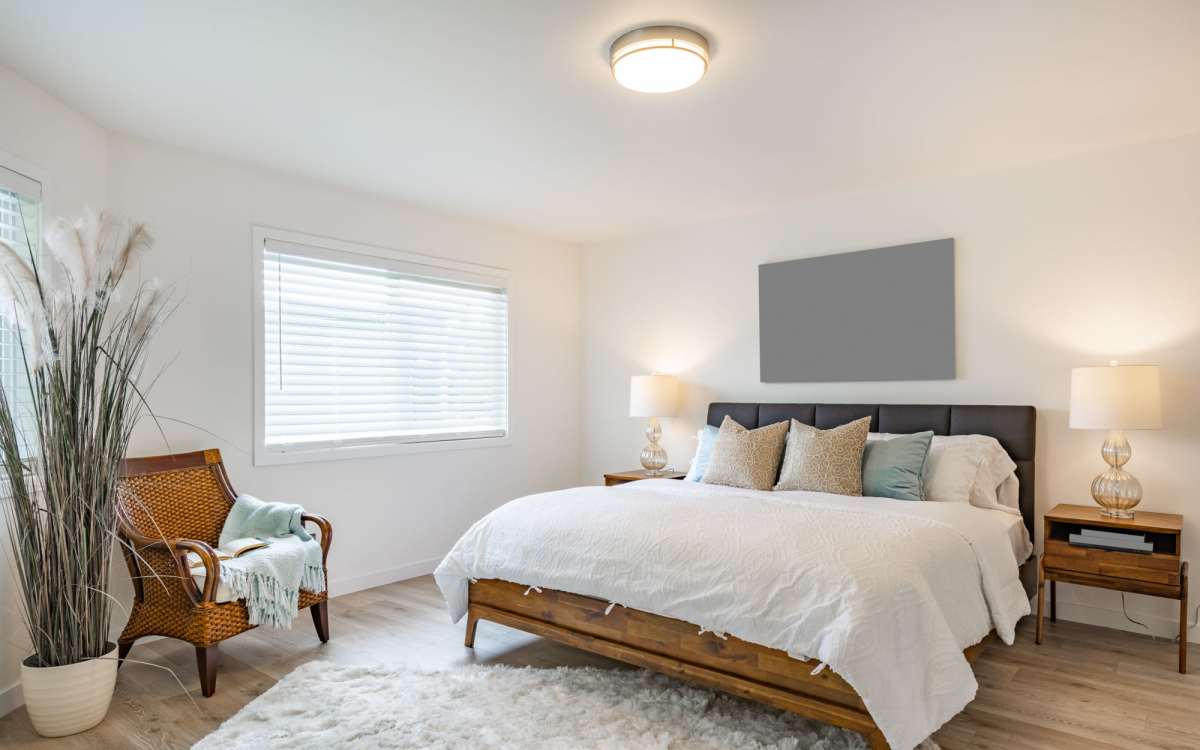 Bedroom with window at Woodland Apartments San Antonio in San Antonio, Texas