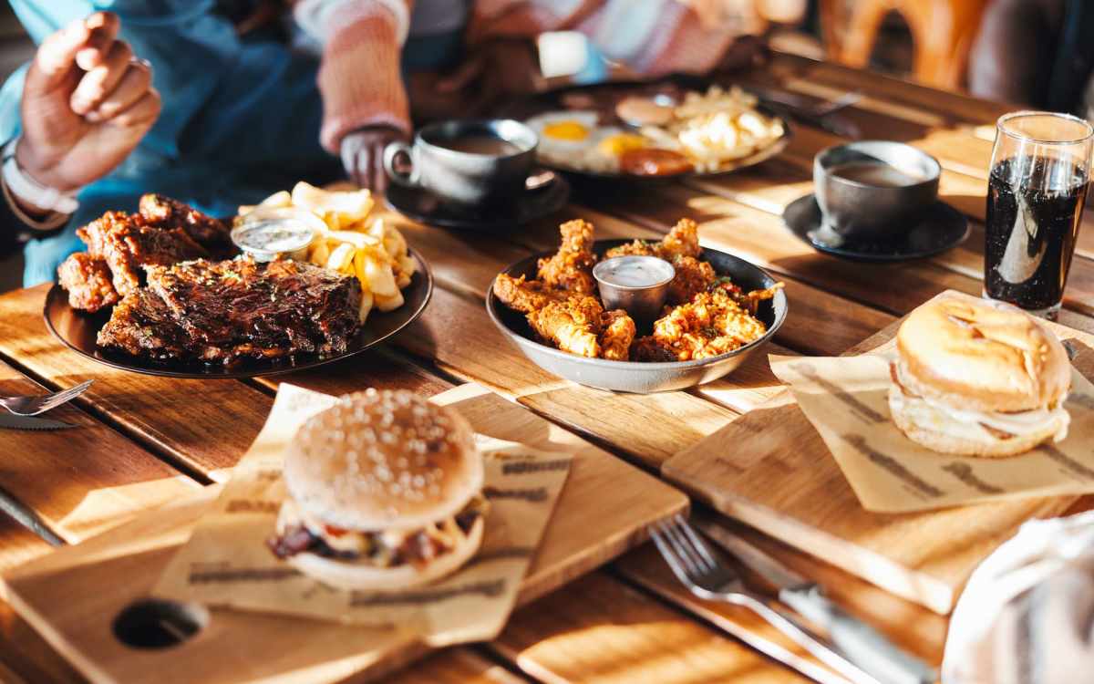 Residents having wide range of dishes at a restaurant near Village at Town Park in Hampton, Virginia