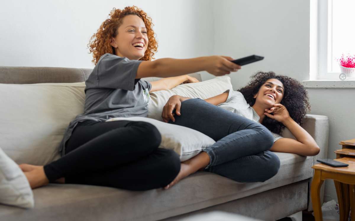 Residents relaxing on a couch at Park City Place in Bridgeport, Connecticut