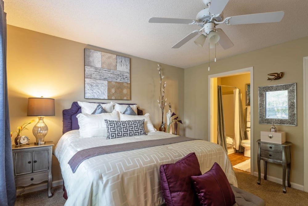 Ceiling fan and plush carpeting in a model home's living area at Palmetto Pointe in Myrtle Beach, South Carolina