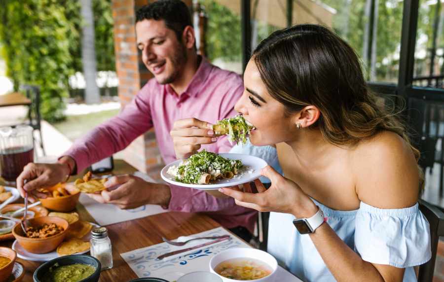 Woman alanong with her bike in downtown not far from Madrid Apartments in Mission Viejo, California, 
