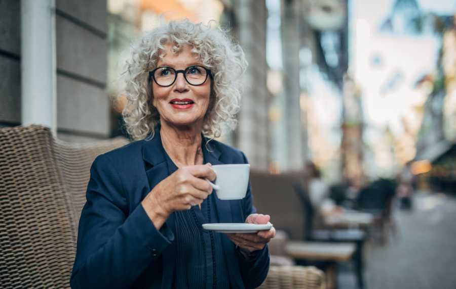A woman having coffee near Villa Montanaro in Pleasant Hill,California