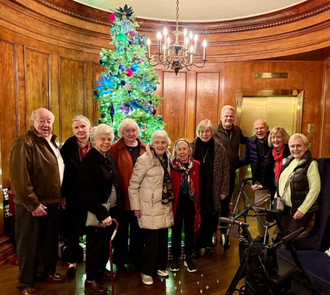 Residents posing for a group photo at The Bellettini