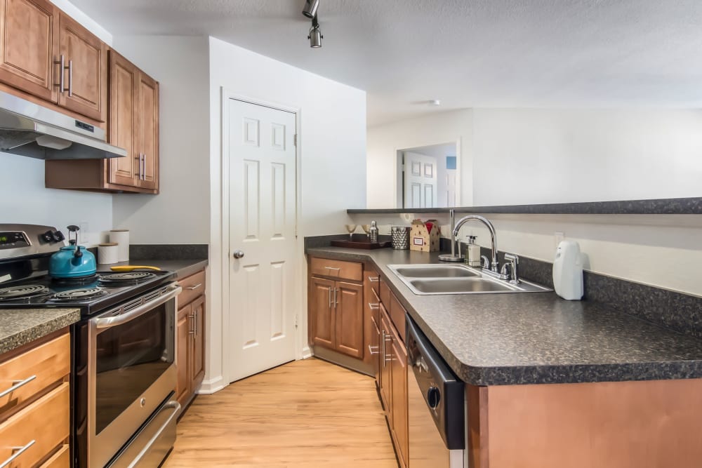 Beautiful kitchen in model home at Cascade Falls Apartments in Akron, Ohio