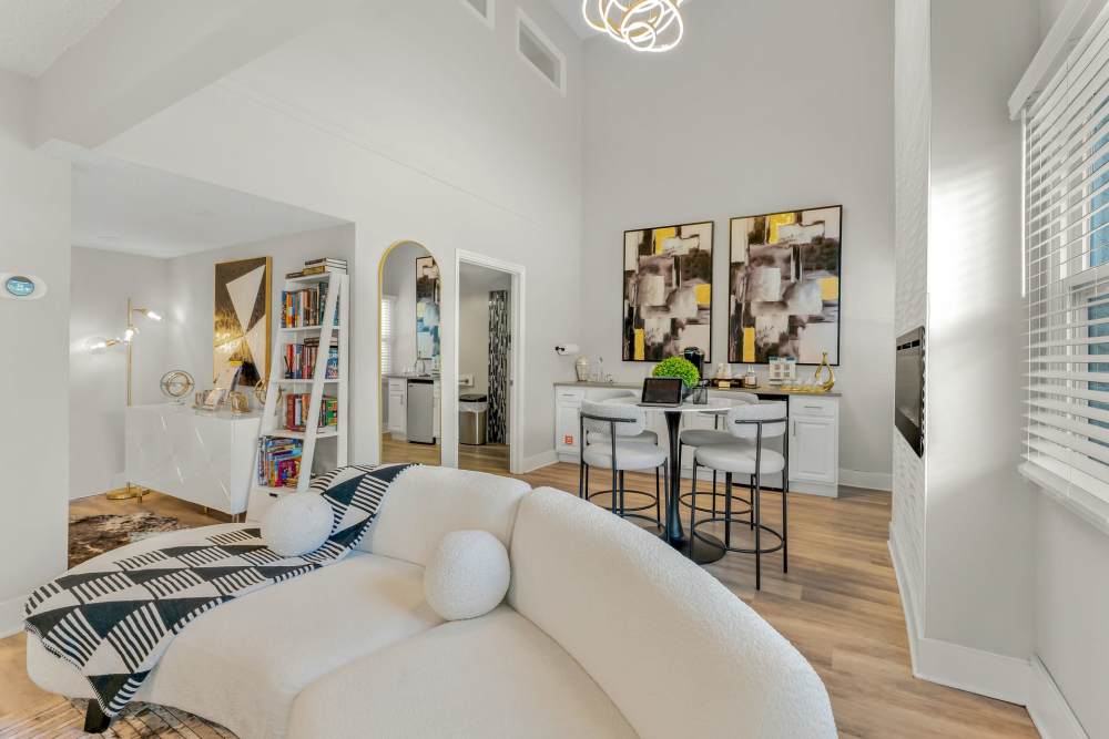 Interior View Of A Living Room With High Ceilings, Modern Decor, And Access To Other Rooms at The Palms at Casselberry in Casselberry, Florida