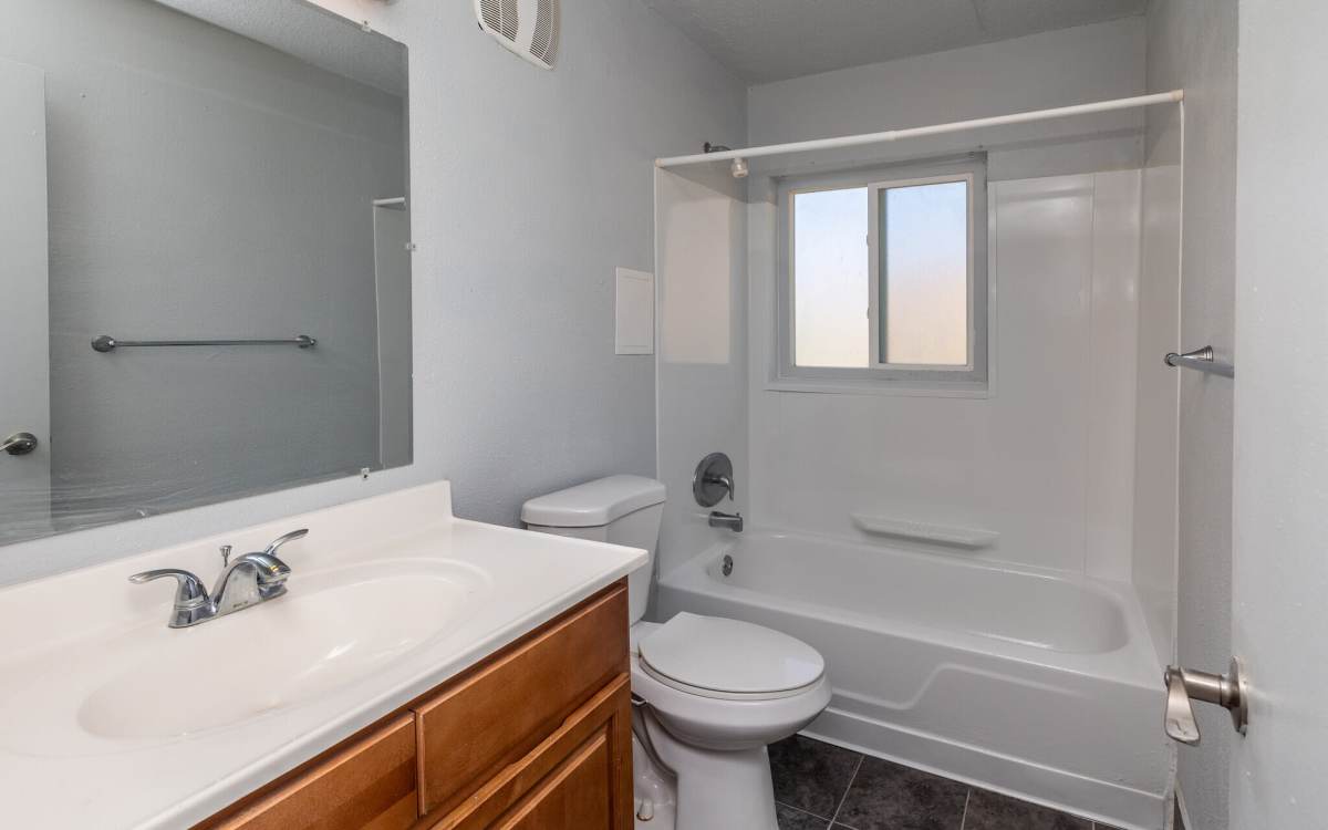 Bathroom with sink at Monaco Arms in Jacksonville, Florida