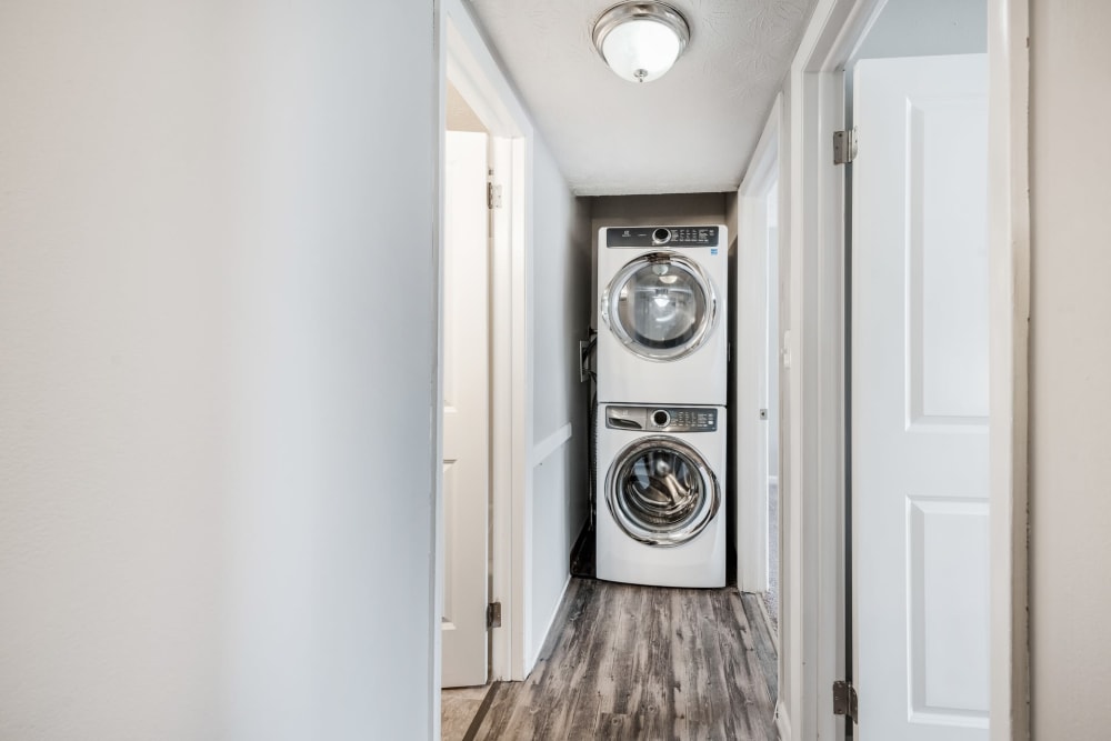 Washer and dryer in an apartment at Fox and Hounds Apartments in Columbus, Ohio
