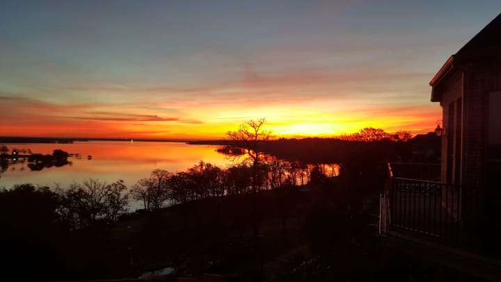 Beautiful sunrise view at Lake Lewisville near Olympus Boulevard