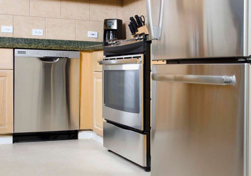 Kitchen with dishwasher at Renaissance Preserve Senior in Fort Myers, Florida