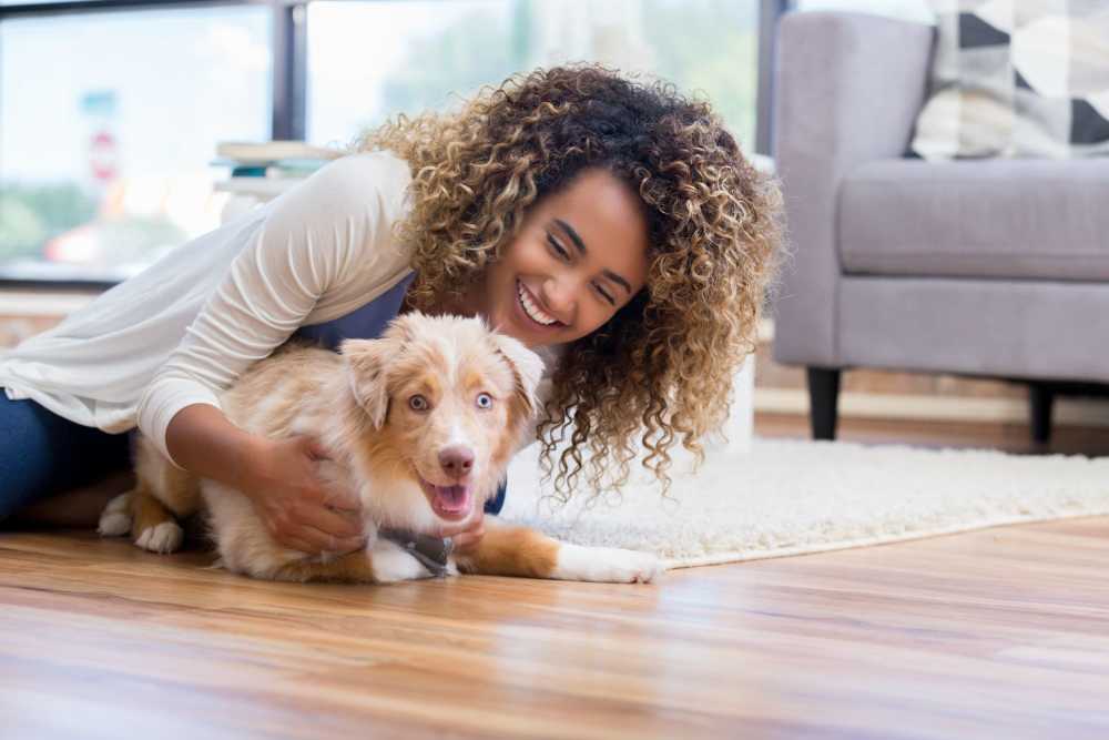 Resident and her cute dog at Home Place Apartments in East Ridge, Tennessee