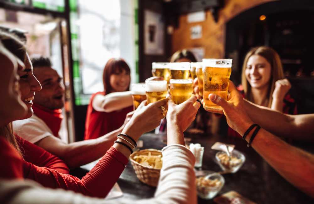 Residents having drinks at a local bar near Ascent Apartments in Colorado Springs, Colorado