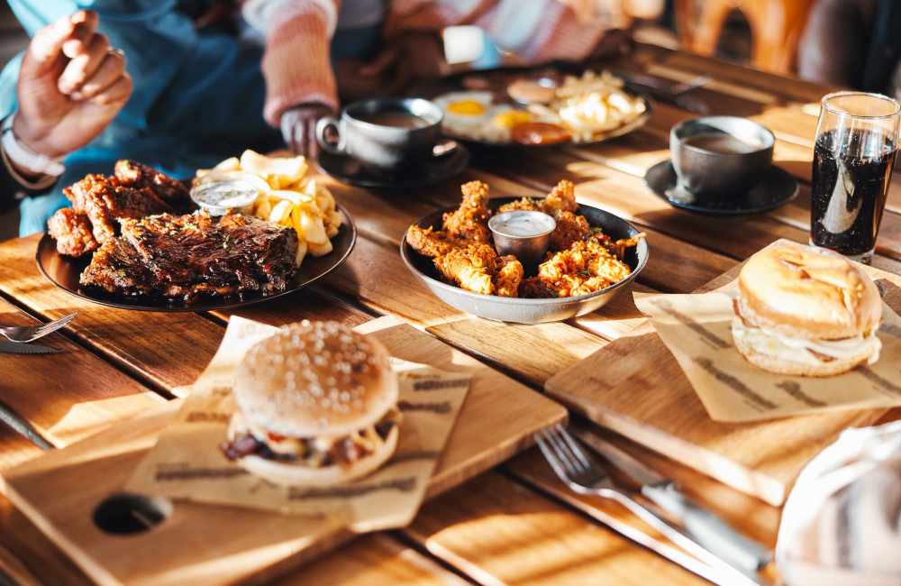 Piggin’ Out Bar-B-Que near The Crossings at Bear Creek Apartments in Lakewood, Colorado