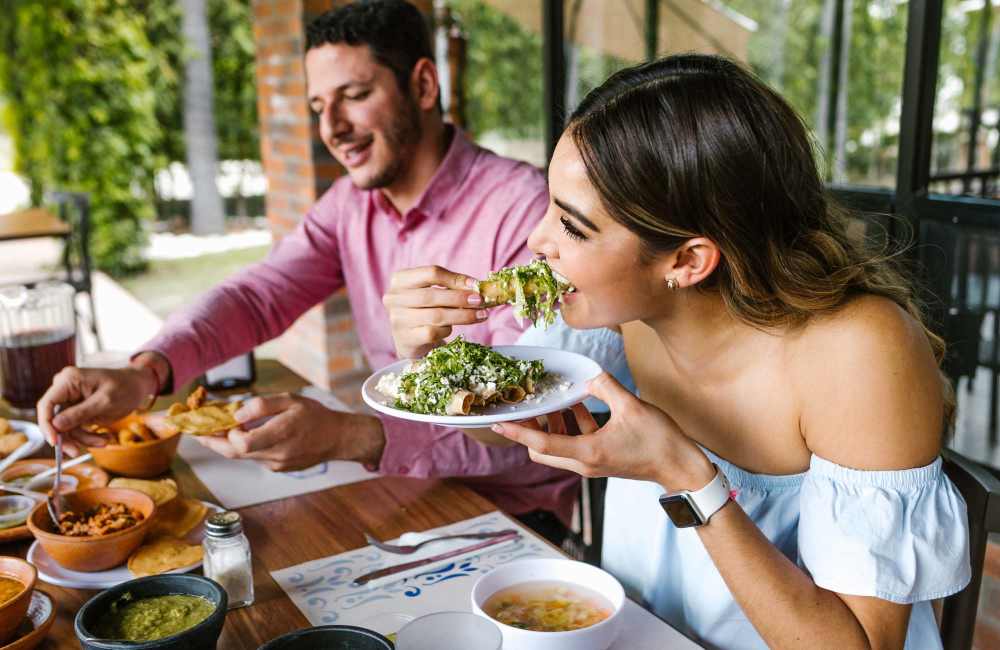 Friends having food near The Addison Apartments in Vancouver, Washington
