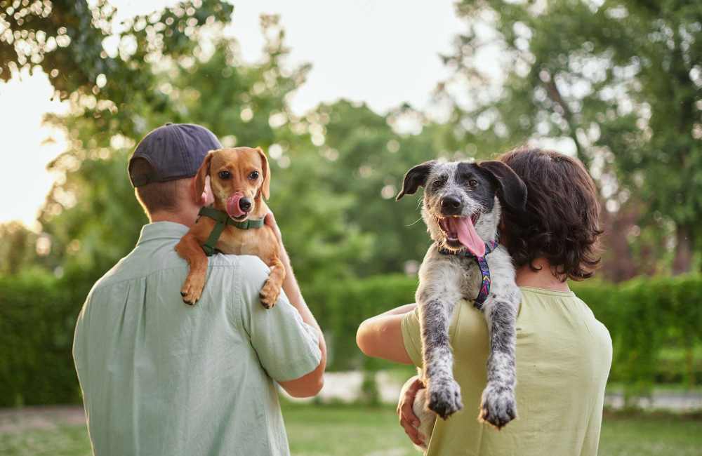 Resident holding their dogs at Aspen Village in Broken Arrow, Oklahoma