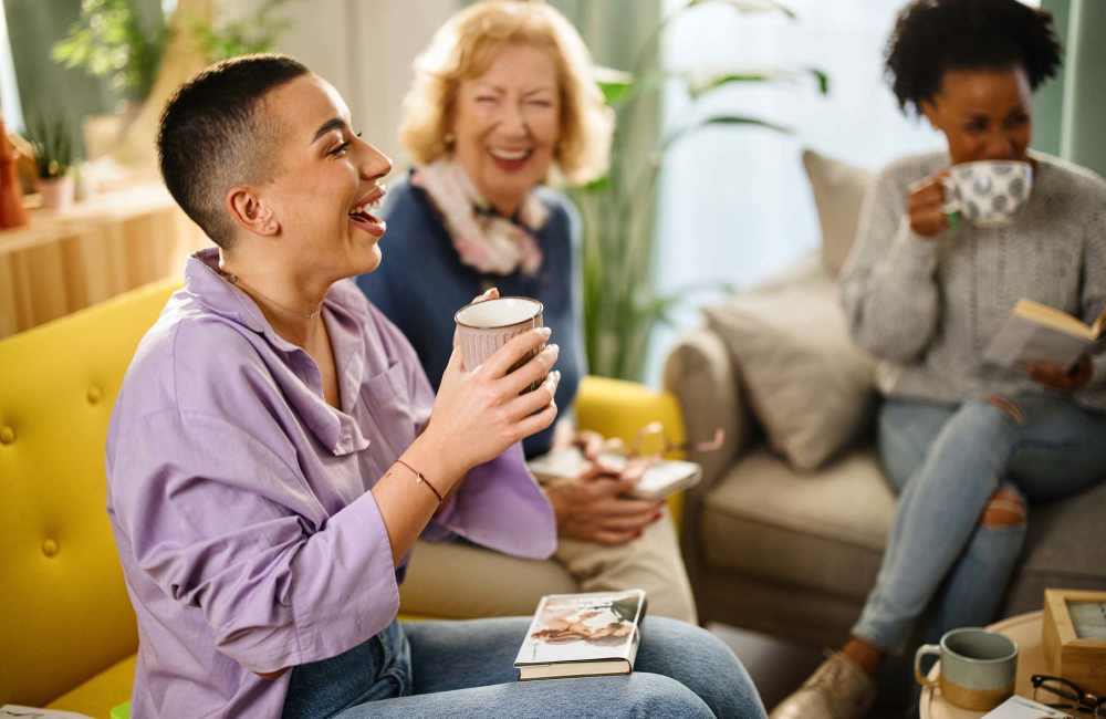 Residents having happy conversations at community clubhouse at Winchester Run in Oklahoma City, Oklahoma