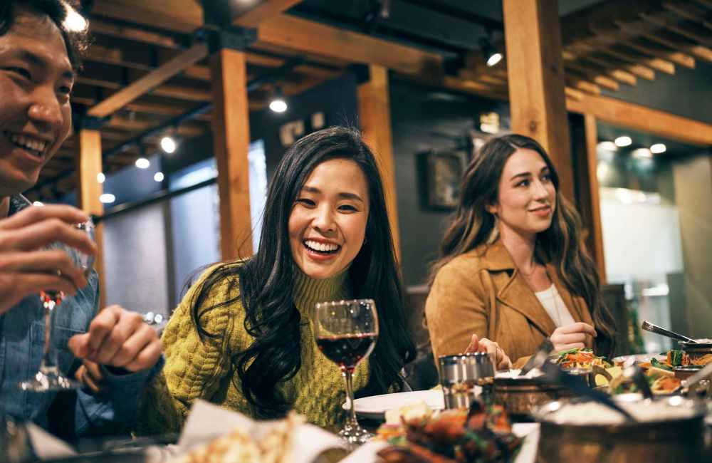 Residents dining in a restaurant near Park Plaza in Baltimore, Maryland