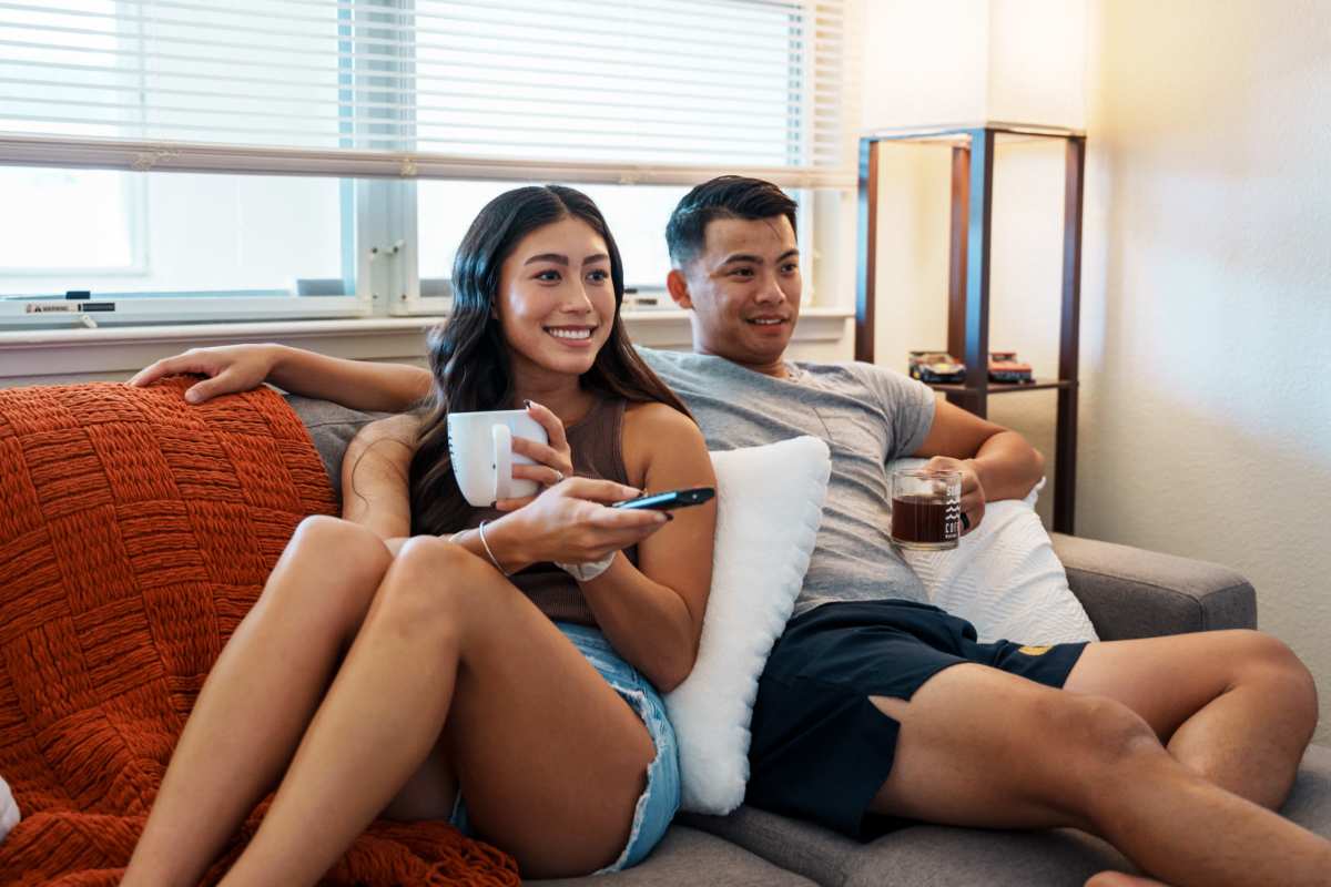 Couple relaxing at Stoney Run Townhomes in Columbia, Maryland           