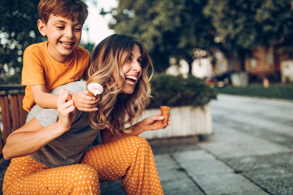 Mother and son enjoying some ice cream at Devonwood Apartment Homes in Charlotte, North Carolina