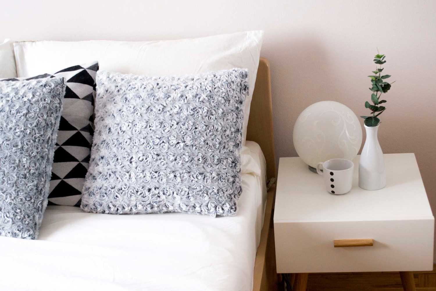 Cozy bedroom at Spring Hollow Apartments in Brighton, Colorado