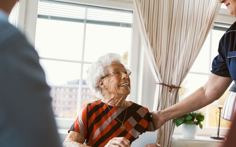 Group of residents socializing at The Blake at Charlottesville in Charlottesville, Virginia
