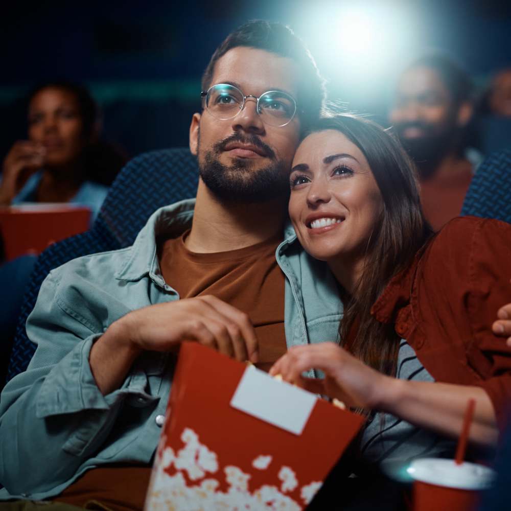 Resident couple watching movie near Legacy Trace in Benson, North Carolina