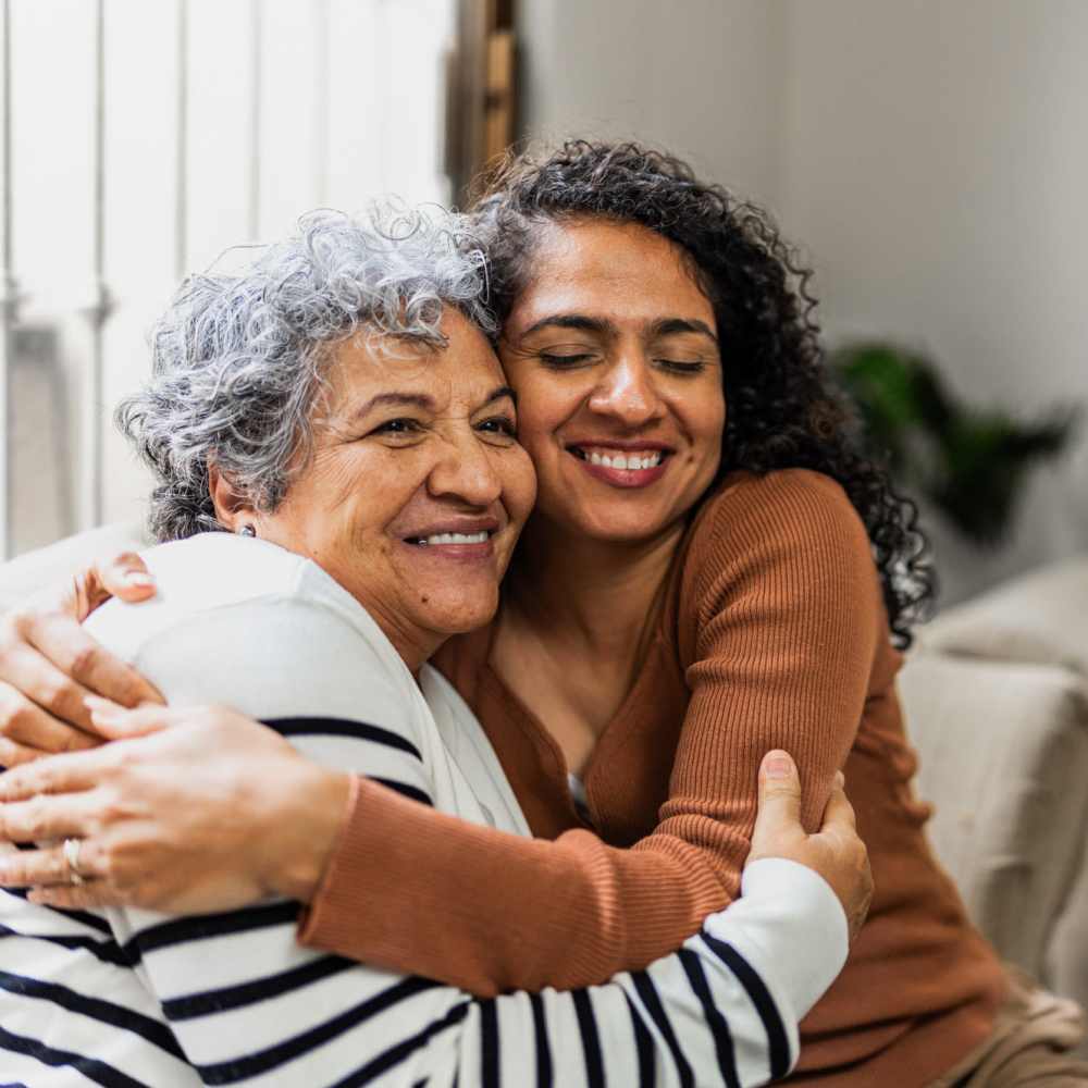 Happy family at Amberly Trace Apartments in Burlington, North Carolina