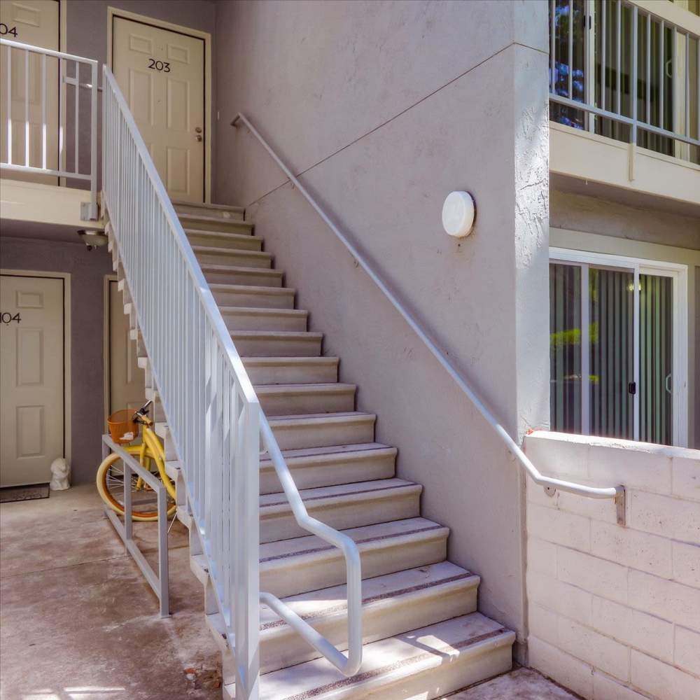 Stairs leading to the above floor at Terman Apartments in Palo Alto, California, 