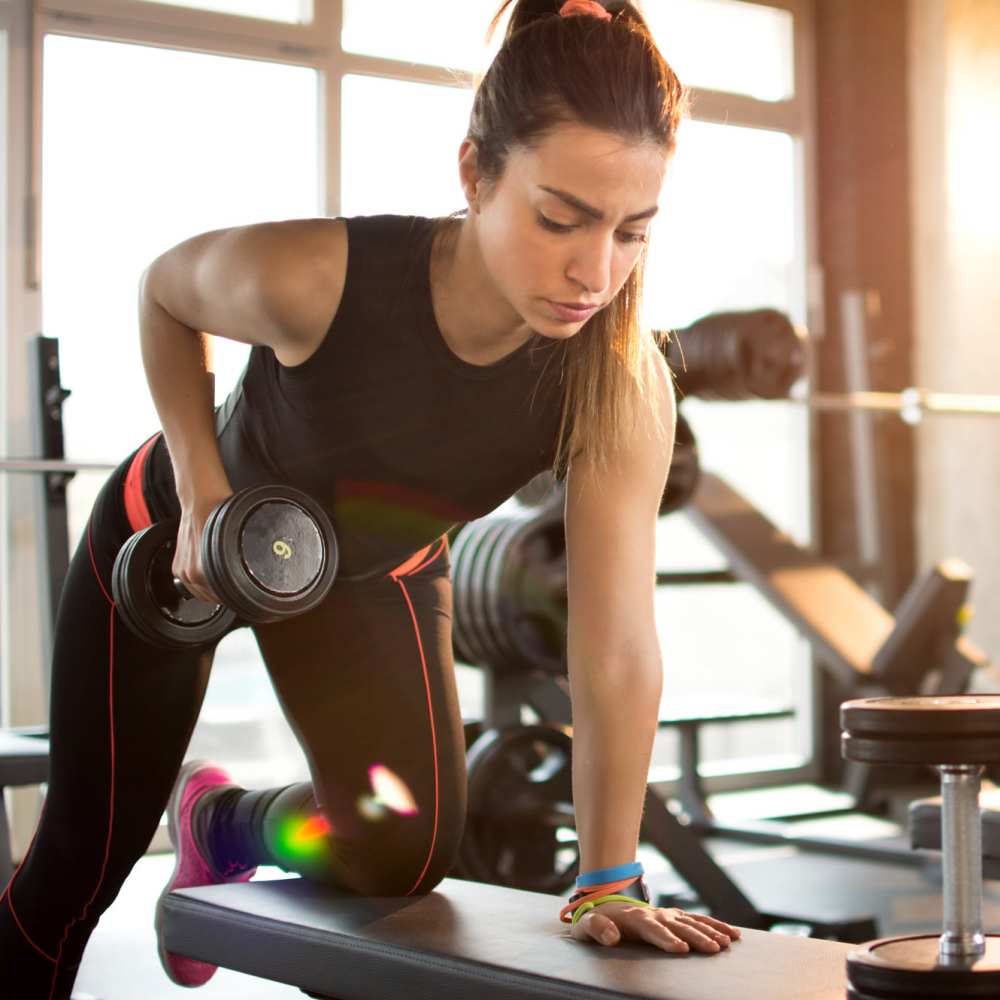Residnet working out in fitness center at Mills Creek in Gastonia, North Carolina