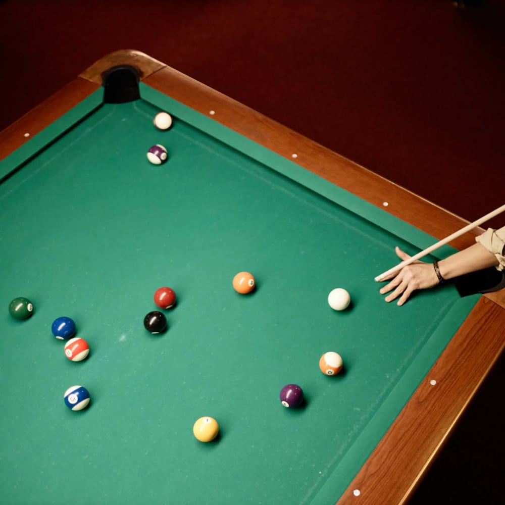 Clubhouse with pool table at Redland Crossings in Naranja, Florida