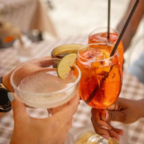 Friends enjoying drinks near Marea in Dana Point, California  