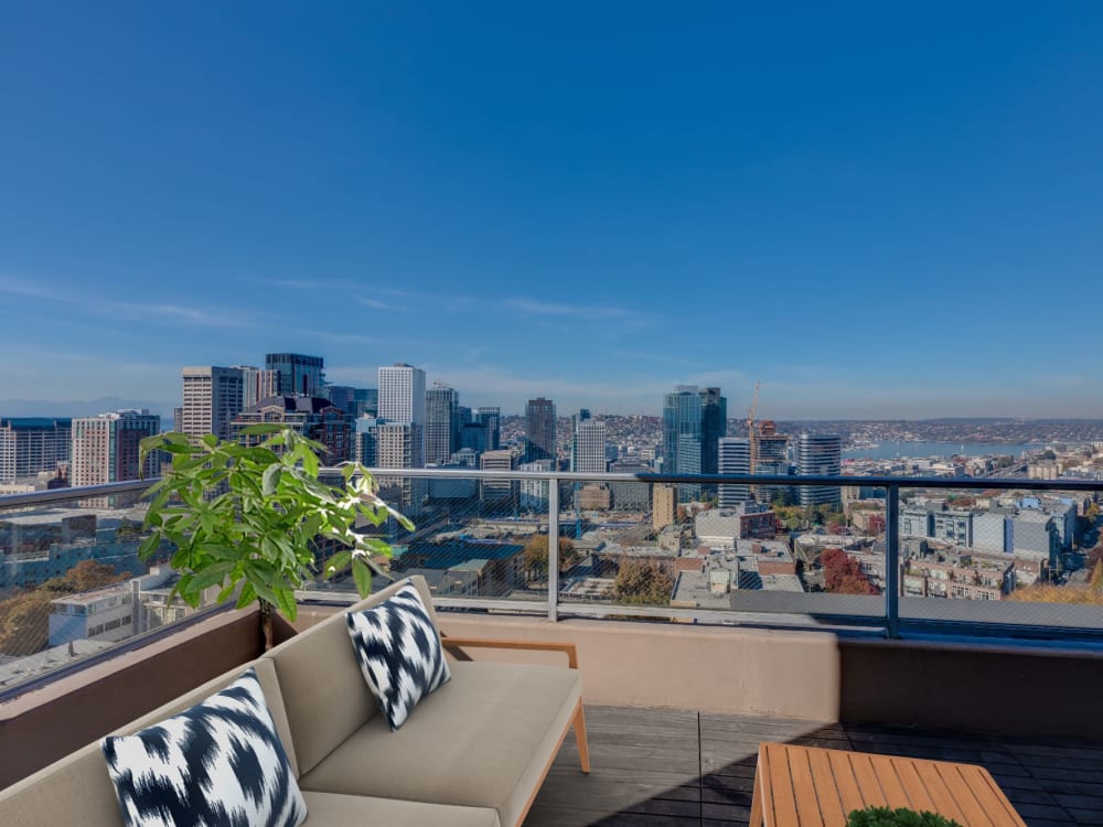 Rooftop lounge area with beautiful views at Panorama Apartments in Seattle, Washington