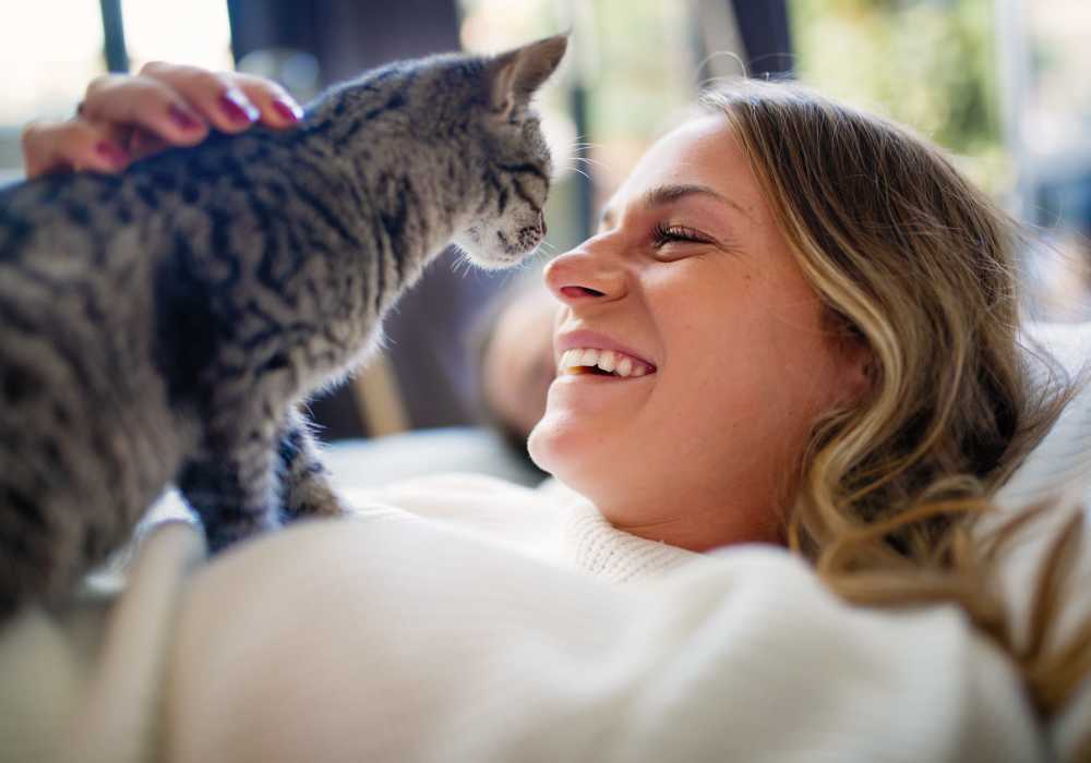 Resident playing with her cat at The Bluffs in Rancho Cucamonga, California