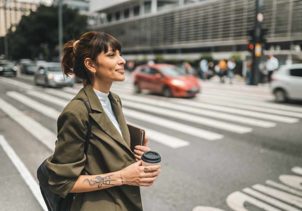Resident walking outside at Cresta Bella in San Diego, California