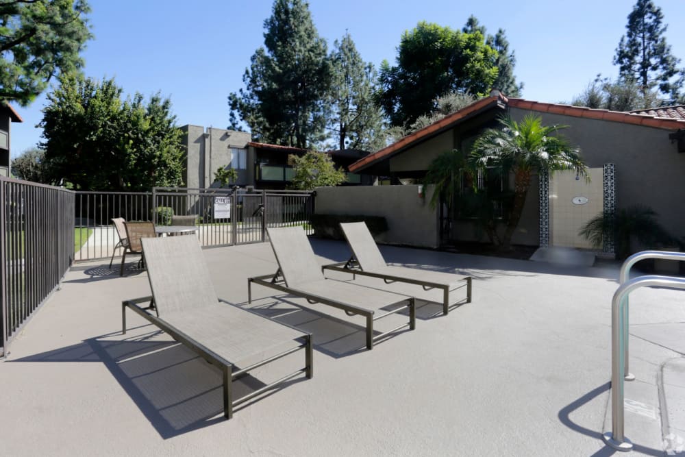 Lounge area by the pool at Olive Ridge in Pomona, California