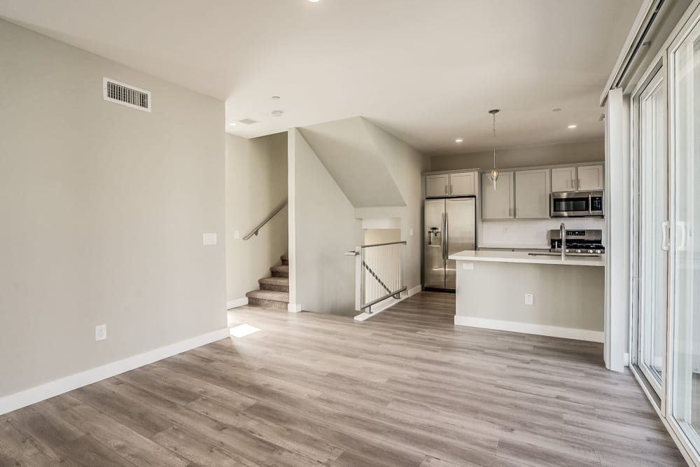Beautiful open-concept floor plan with hardwood floors in a model home at Novella at Arcadia in Phoenix, Arizona