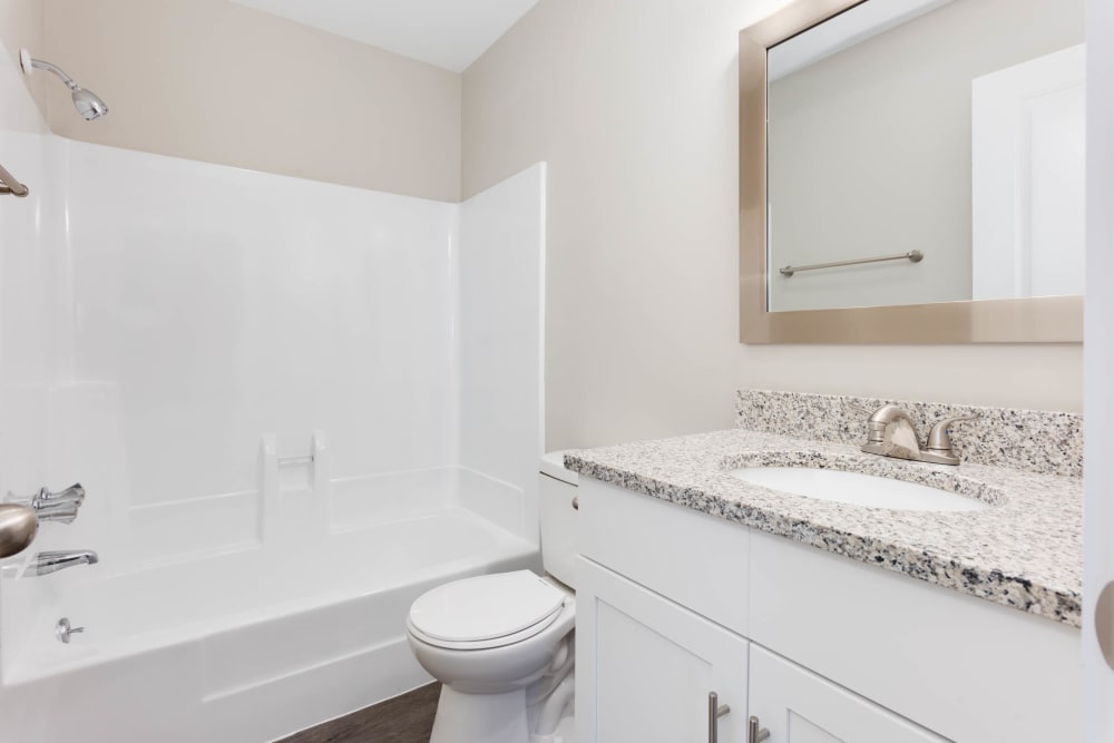 New Upgrades in Select Units: Granite Countertops, Framed Mirror, New Floors and Faucets in the Bathroom The Hills at Oakwood Apartment Homes in Chattanooga, Tennessee