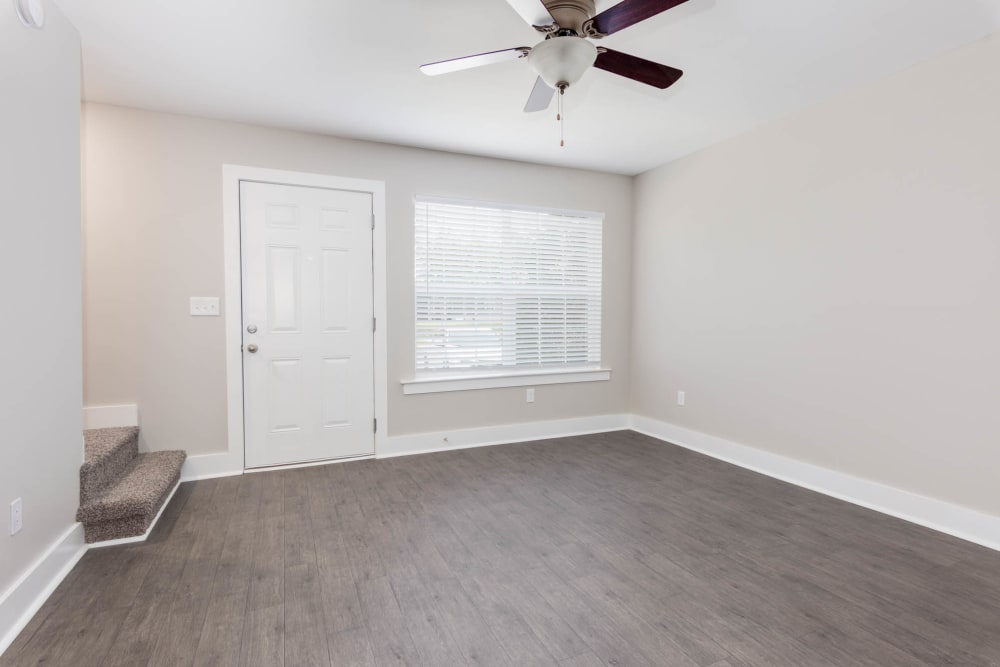 Beautiful new flooring in bright expansive living rooms The Hills at Oakwood Apartment Homes in Chattanooga, Tennessee