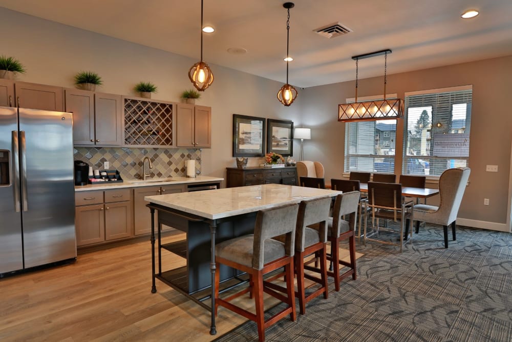 Community kitchen area with gorgeous lighting at The Fairway Apartments in Salem, Oregon