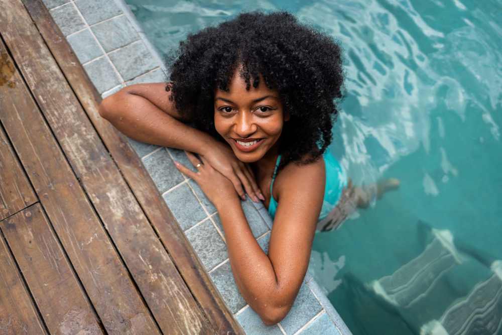 Resident inside the swimming pool at Parkridge Apartments in Durant, Oklahoma