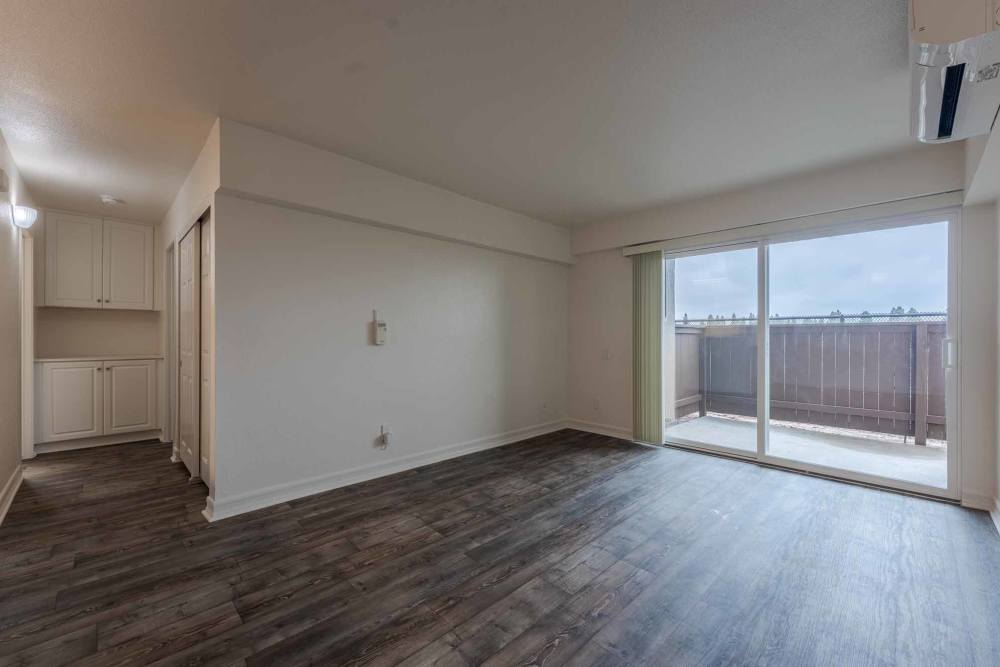 Wood flooring in a townhome living room at Beech St. Knolls in San Diego, California