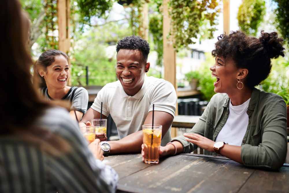 Friends grabbing drinks near Pine Ridge at Reynolda in Winston-Salem, North Carolina