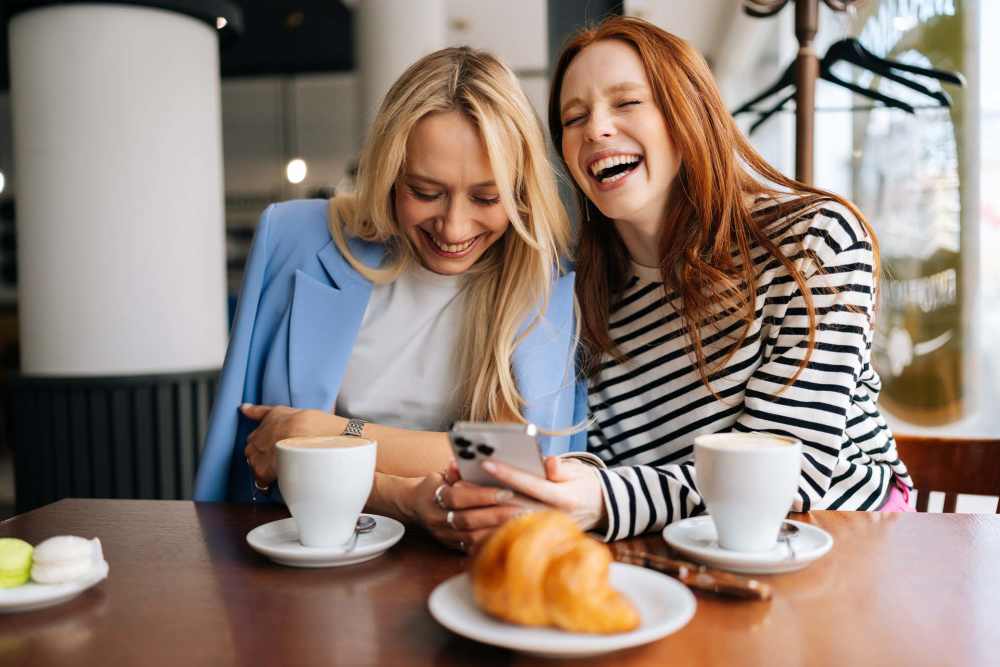 Friends enjoying coffee together at their favorite cafe near Alcove at Alamo Heights in San Antonio, Texas 