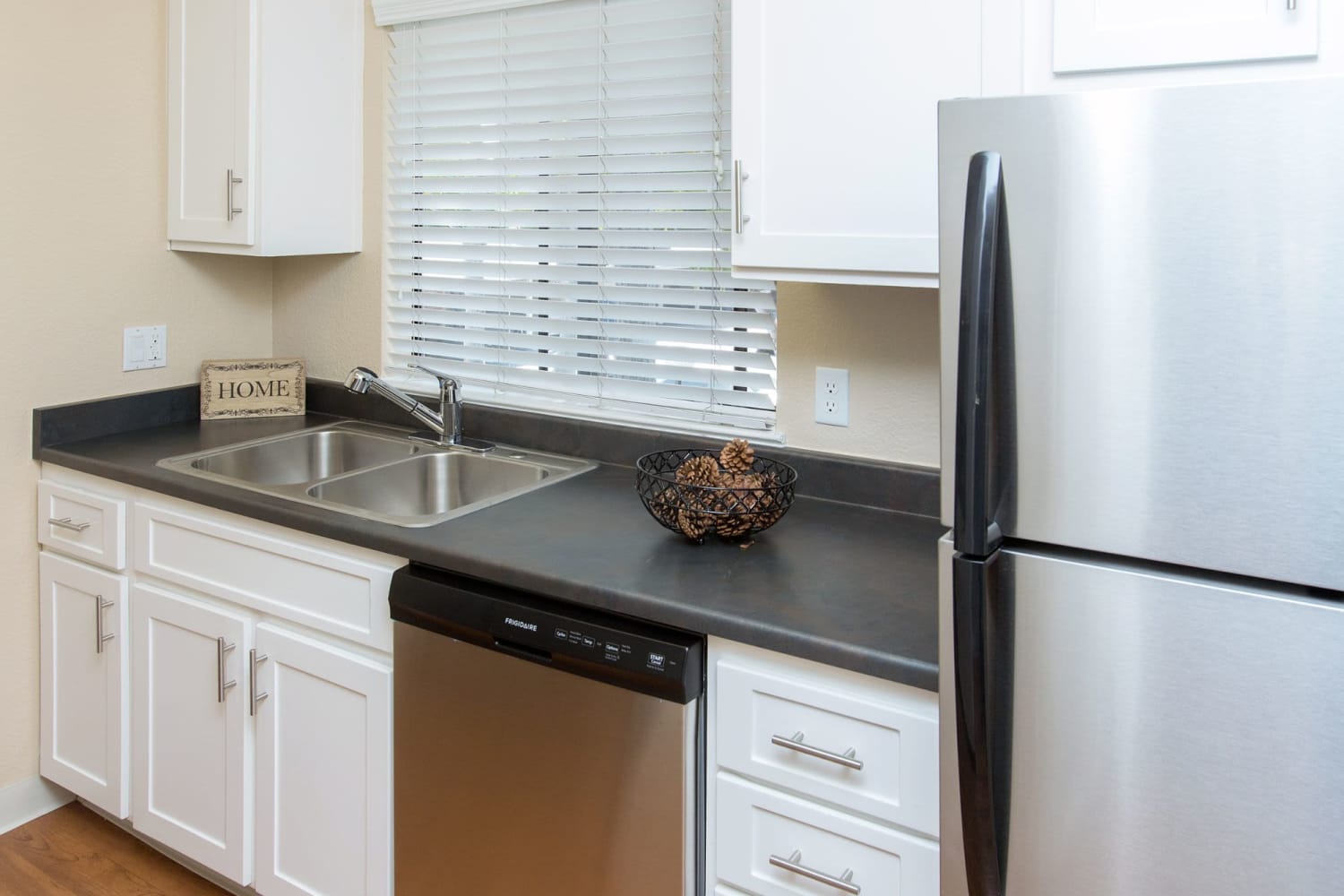 Kitchen photo featuring a new fridge at Amber Court in Fremont, California